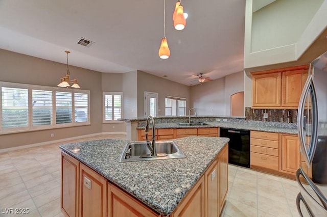 7540 Crystal Cave Dr, Las Vegas, NV 89117 - kitchen featuring dishwasher, a sink, freestanding refrigerator, and light tile patterned flooring