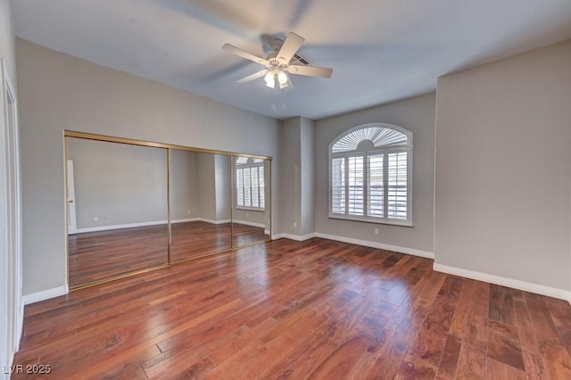 7540 Crystal Cave Dr, Las Vegas, NV 89117 - unfurnished bedroom with wood finished floors, a ceiling fan, and a closet