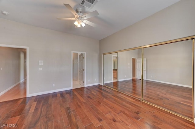 7540 Crystal Cave Dr, Las Vegas, NV 89117 - unfurnished bedroom with wood finished floors, connected bathroom, ceiling fan, and a closet