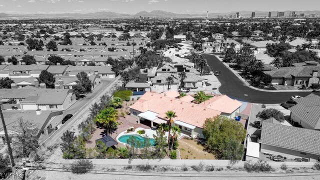 7540 Crystal Cave Dr, Las Vegas, NV 89117 - aerial view of residential area with a pool and a mountain backdrop