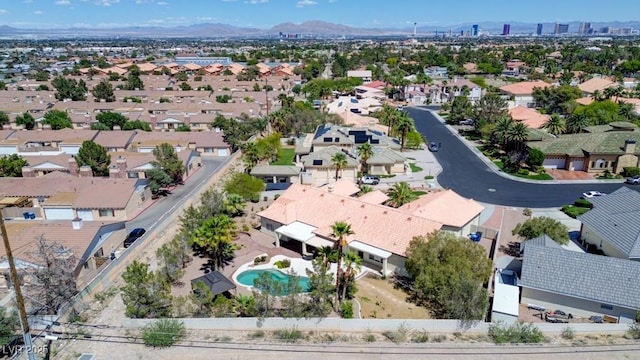 7540 Crystal Cave Dr, Las Vegas, NV 89117 - aerial perspective of suburban area featuring a mountain backdrop and a pool