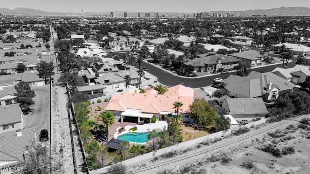 7540 Crystal Cave Dr, Las Vegas, NV 89117 - aerial view of residential area with a pool area and a mountainous background