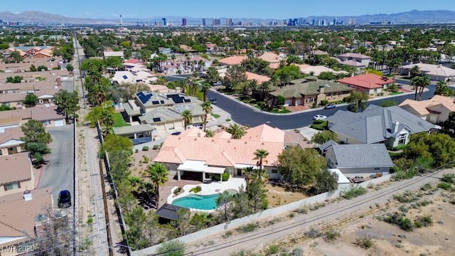 7540 Crystal Cave Dr, Las Vegas, NV 89117 - aerial view of residential area with a pool area and a mountainous background