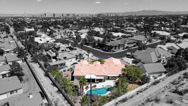 7540 Crystal Cave Dr, Las Vegas, NV 89117 - aerial view of residential area with a pool and mountains