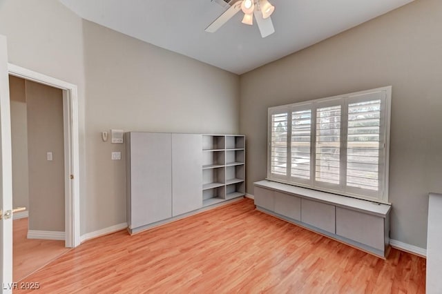 7540 Crystal Cave Dr, Las Vegas, NV 89117 - unfurnished bedroom featuring wood finished floors and a ceiling fan