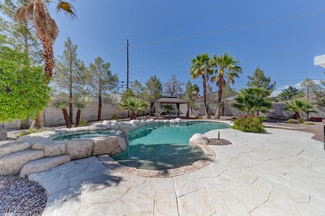 7540 Crystal Cave Dr, Las Vegas, NV 89117 - view of pool featuring a gazebo, a fenced backyard, a patio, and a pool with connected hot tub