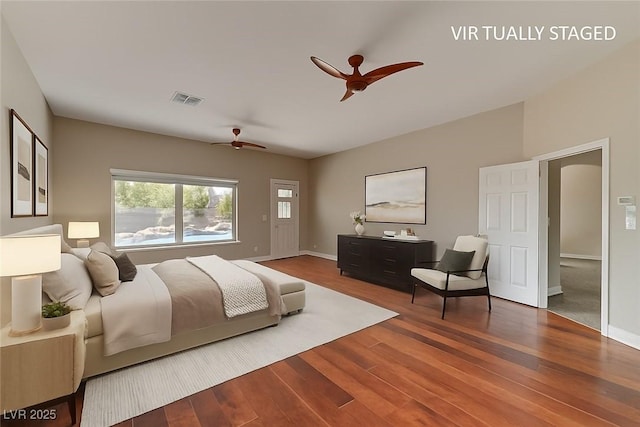 7540 Crystal Cave Dr, Las Vegas, NV 89117 - bedroom featuring wood finished floors and a ceiling fan
