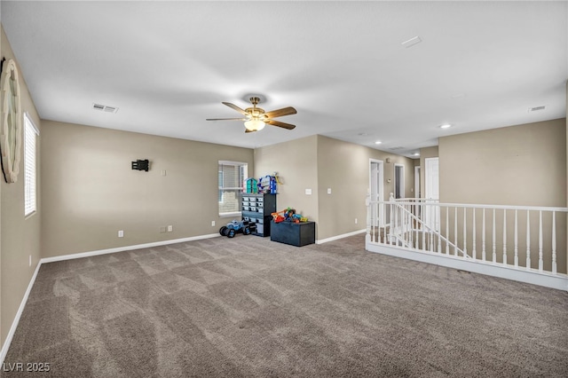 spare room featuring a ceiling fan, carpet, baseboards, and recessed lighting
