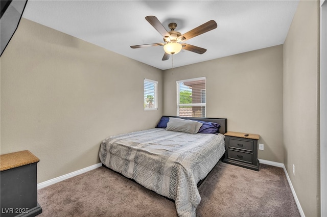 bedroom with carpet, baseboards, and ceiling fan