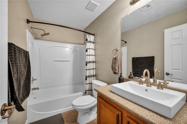 bathroom featuring toilet, shower / bath combo with shower curtain, vaulted ceiling, and vanity