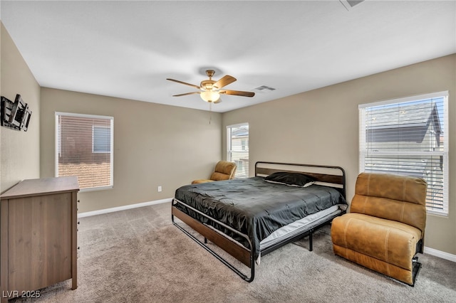 bedroom featuring carpet floors, baseboards, and ceiling fan