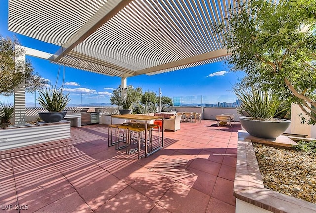150 Las Vegas Blvd Unit 2016, North Las Vegas, NV 89101 - view of patio / terrace with area for grilling, a pergola, and an outdoor bar