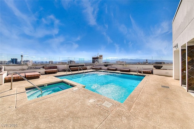 150 Las Vegas Blvd Unit 2016, North Las Vegas, NV 89101 - view of pool featuring an in-ground hot tub and a patio area