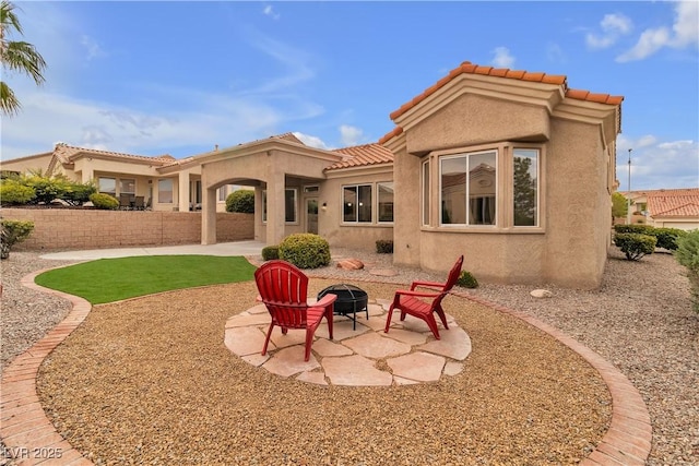 10801 Clarion Ln, Las Vegas, NV 89134 - back of property featuring a tile roof, stucco siding, and a patio area
