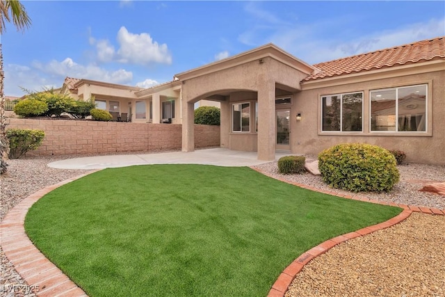 10801 Clarion Ln, Las Vegas, NV 89134 - back of house with stucco siding, a patio area, and a tiled roof