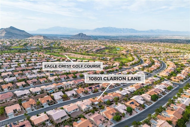 10801 Clarion Ln, Las Vegas, NV 89134 - aerial overview of property's location featuring a mountain backdrop and nearby suburban area