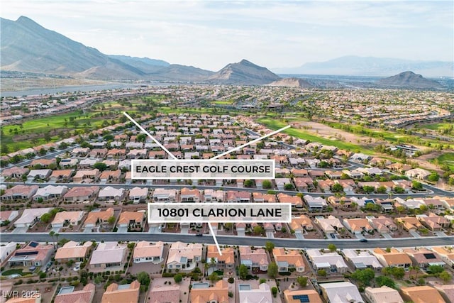 10801 Clarion Ln, Las Vegas, NV 89134 - aerial view of property and surrounding area featuring a mountain backdrop and nearby suburban area