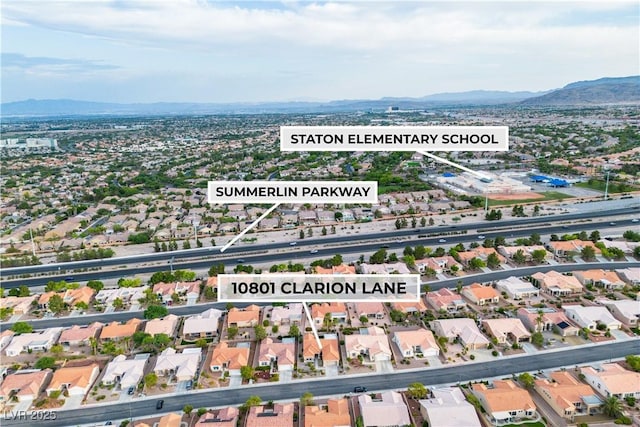 10801 Clarion Ln, Las Vegas, NV 89134 - aerial perspective of suburban area featuring a mountain backdrop