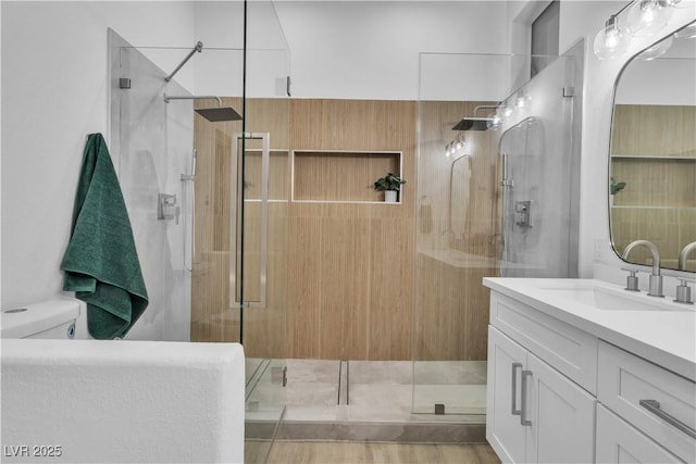 10801 Clarion Ln, Las Vegas, NV 89134 - full bathroom with a stall shower, vanity, and toilet