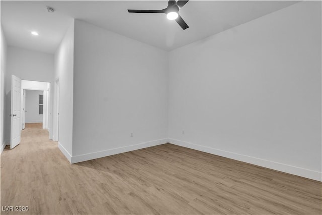 10801 Clarion Ln, Las Vegas, NV 89134 - spare room featuring light wood-style floors, baseboards, and ceiling fan