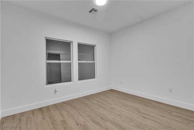 10801 Clarion Ln, Las Vegas, NV 89134 - unfurnished room with wood finished floors and baseboards