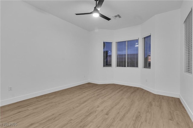 10801 Clarion Ln, Las Vegas, NV 89134 - spare room with light wood finished floors, ceiling fan, and baseboards
