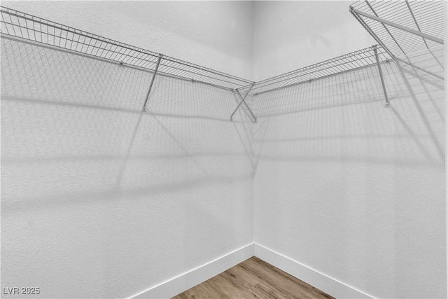 10801 Clarion Ln, Las Vegas, NV 89134 - spacious closet featuring wood finished floors