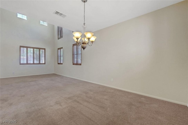 11444 Steponia Bay St, Las Vegas, NV 89141 - empty room with a chandelier, light colored carpet, and baseboards