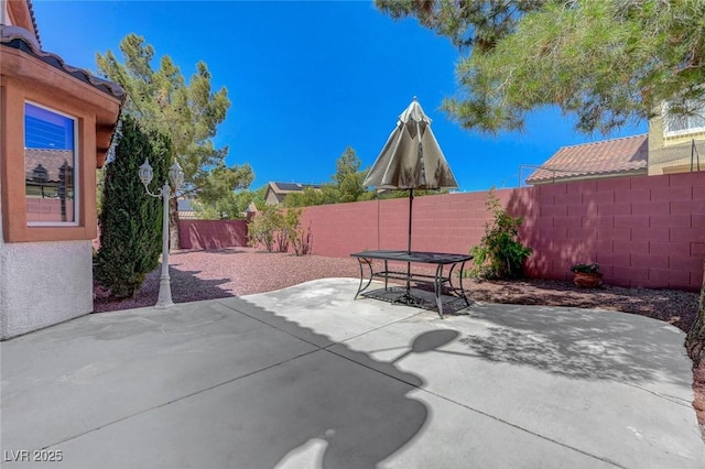 11444 Steponia Bay St, Las Vegas, NV 89141 - view of patio / terrace with a fenced backyard and outdoor dining area