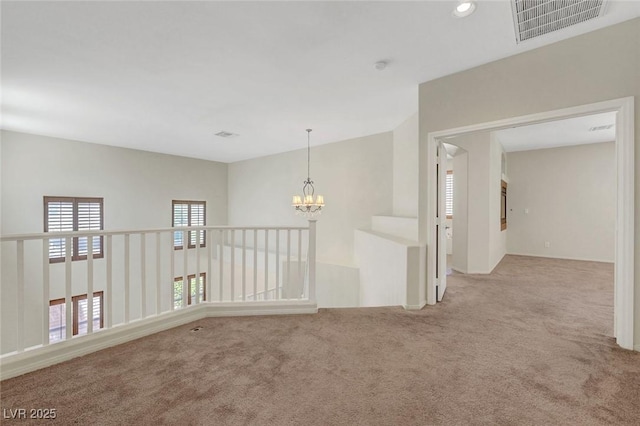 11444 Steponia Bay St, Las Vegas, NV 89141 - carpeted spare room with a chandelier