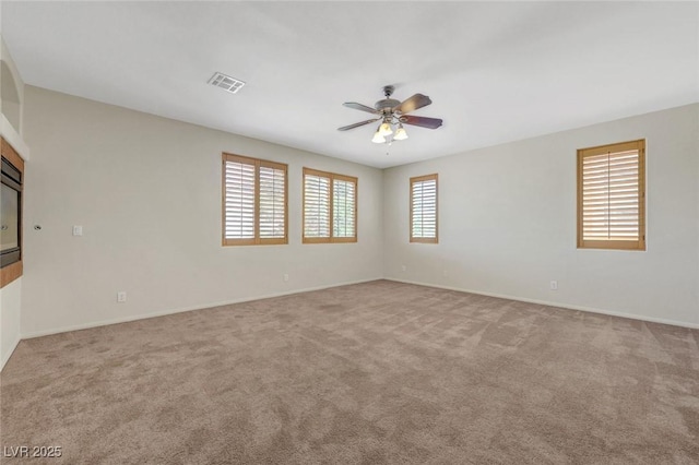 11444 Steponia Bay St, Las Vegas, NV 89141 - spare room with a ceiling fan, carpet floors, and baseboards