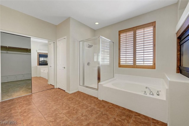 11444 Steponia Bay St, Las Vegas, NV 89141 - bathroom featuring a shower stall, a bath, a spacious closet, tile patterned floors, and recessed lighting