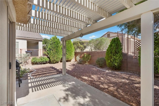 view of patio with a fenced backyard and a pergola