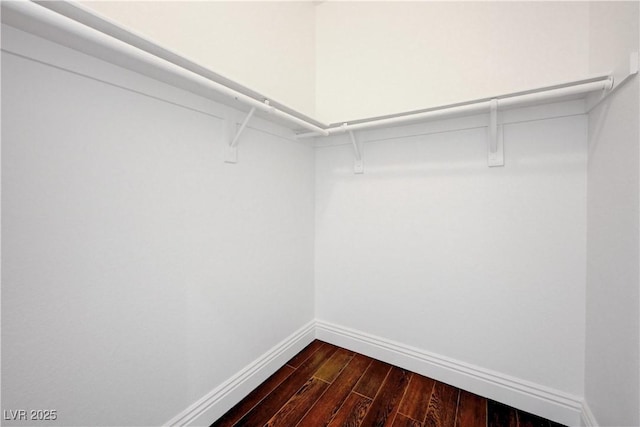 5250 S Rainbow Blvd Unit 2183, Las Vegas, NV 89118 - walk in closet with dark wood-style flooring