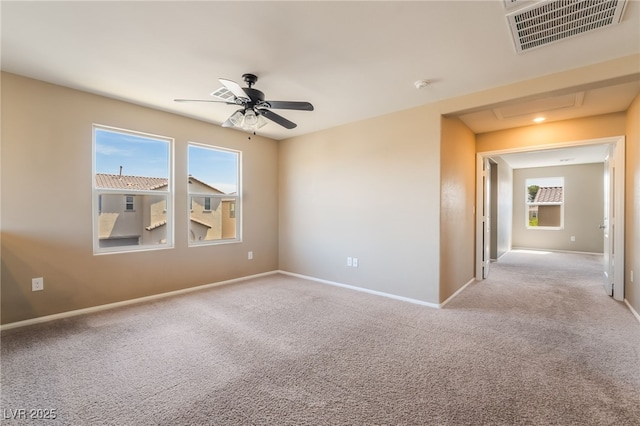 3855 Park Field Dr, Las Vegas, NV 89120 - carpeted empty room featuring plenty of natural light, a ceiling fan, and baseboards