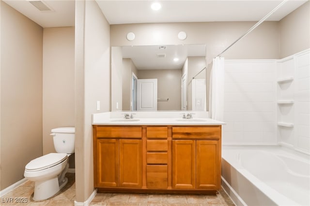 3855 Park Field Dr, Las Vegas, NV 89120 - full bathroom featuring toilet, double vanity, shower / tub combo, tile patterned flooring, and baseboards