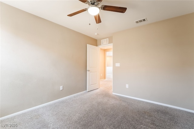 3855 Park Field Dr, Las Vegas, NV 89120 - empty room featuring light colored carpet, a ceiling fan, and baseboards
