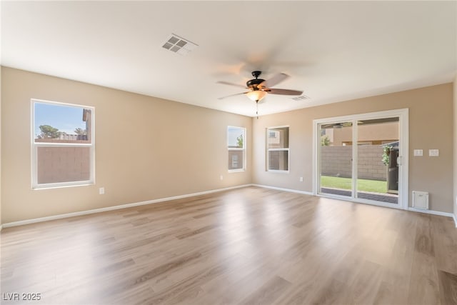 3855 Park Field Dr, Las Vegas, NV 89120 - empty room with a ceiling fan, baseboards, and light wood-style floors