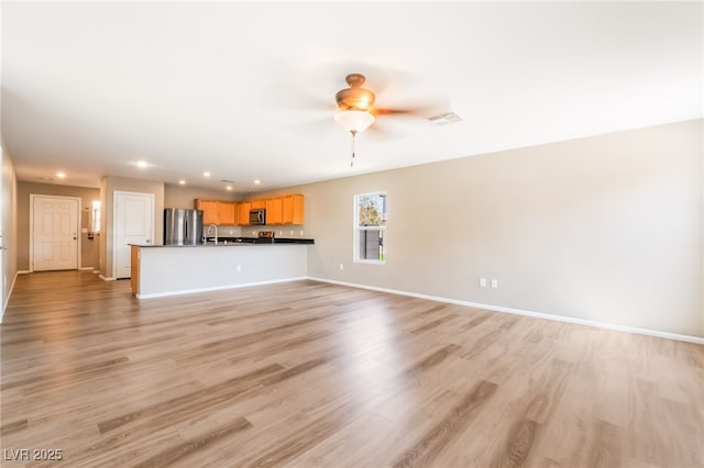 3855 Park Field Dr, Las Vegas, NV 89120 - unfurnished living room with recessed lighting, a ceiling fan, light wood-style floors, and baseboards