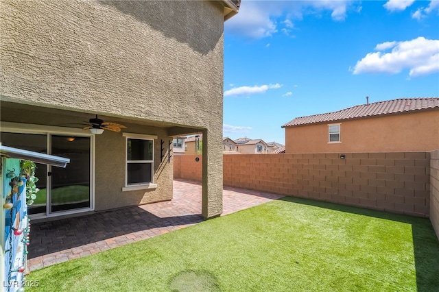 3855 Park Field Dr, Las Vegas, NV 89120 - view of yard featuring ceiling fan and a patio