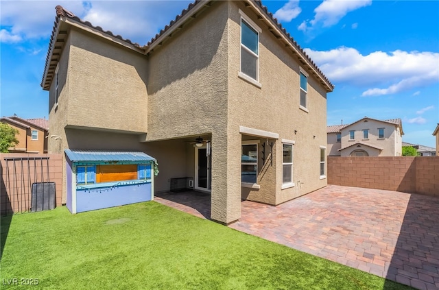 3855 Park Field Dr, Las Vegas, NV 89120 - rear view of house with stucco siding, a patio area, and a tiled roof