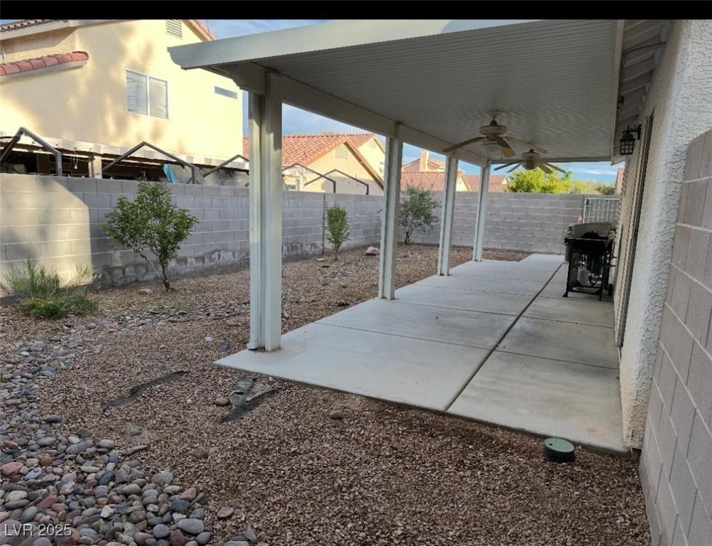 5544 Cloudy Glen St, North Las Vegas, NV 89031 - view of patio / terrace with ceiling fan and a fenced backyard