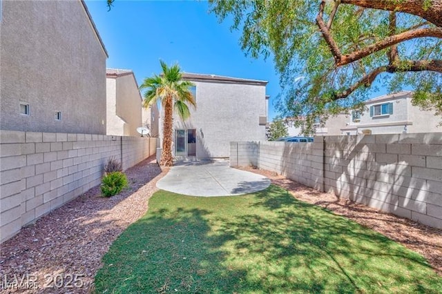 9979 Keephills St, Las Vegas, NV 89183 - view of yard featuring a patio area