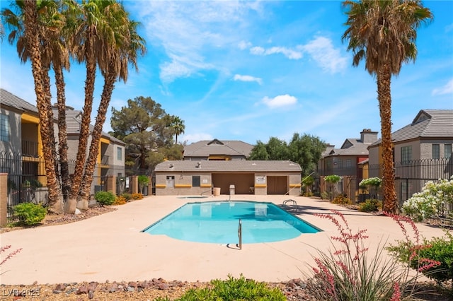 2700 N Rainbow Blvd Unit 1080, Las Vegas, NV 89108 - community pool with fence, a residential view, and a patio area