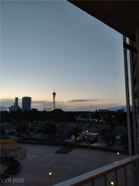 3111 Bel Air Dr Unit 6E, Las Vegas, NV 89109 - view of balcony at dusk