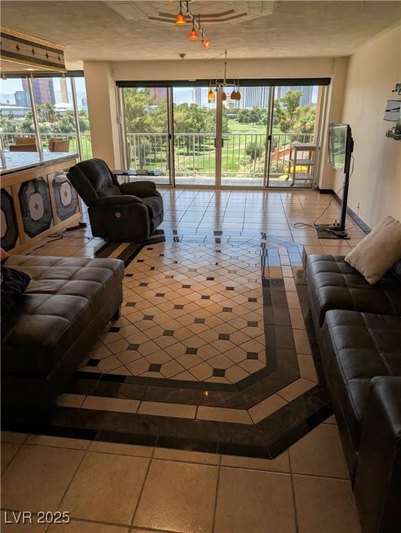 3111 Bel Air Dr Unit 6E, Las Vegas, NV 89109 - tiled living room with plenty of natural light