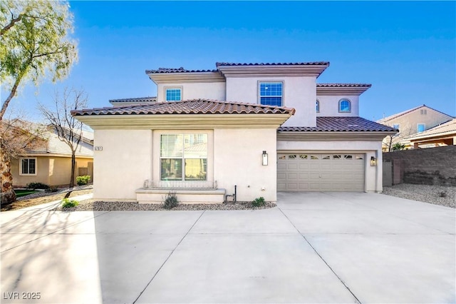 5737 Heather Breeze Ct, Las Vegas, NV 89141 - mediterranean / spanish-style house featuring concrete driveway, fence, stucco siding, and an attached garage