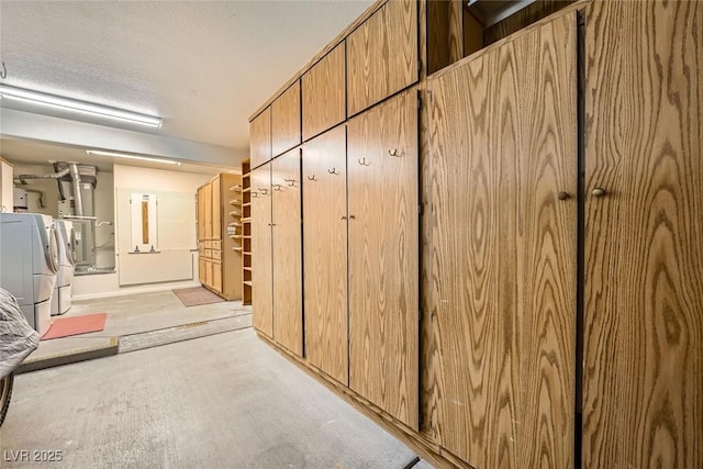 2520 Palmridge Dr, Las Vegas, NV 89134 - basement featuring washing machine and clothes dryer, heating unit, and a textured ceiling