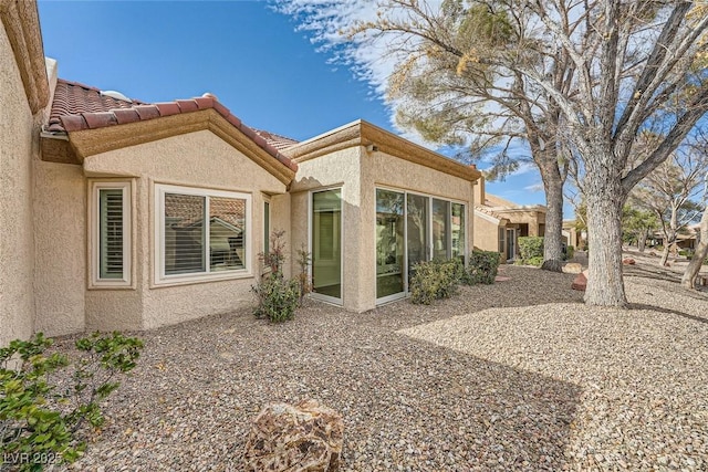 2520 Palmridge Dr, Las Vegas, NV 89134 - rear view of property with stucco siding and a tile roof