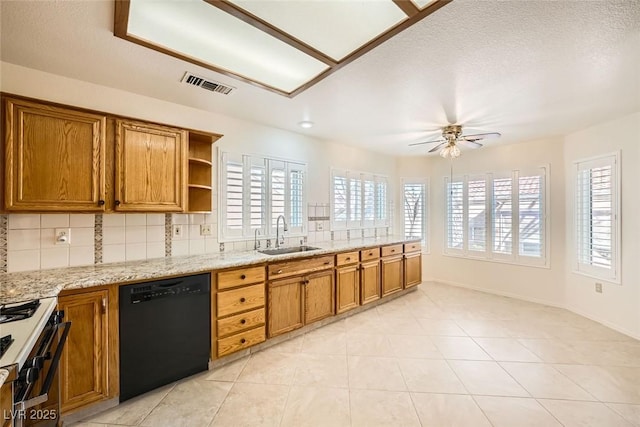 2520 Palmridge Dr, Las Vegas, NV 89134 - kitchen featuring dishwasher, a sink, gas range oven, and brown cabinets